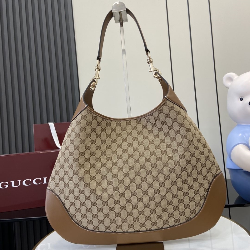 G*u*i top handle bags